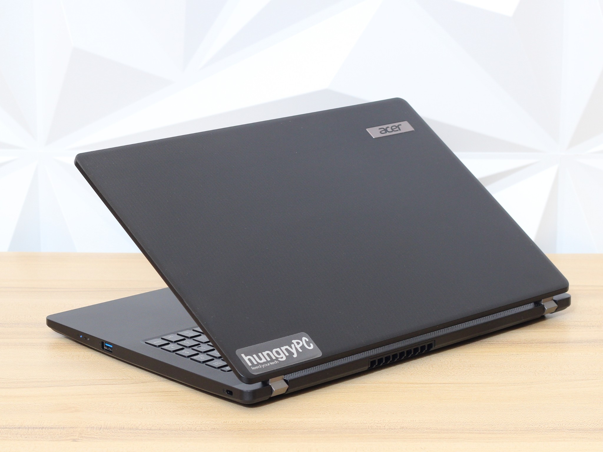 Acer TravelMate P215 52 Laptop Rear exterior lid and rear hinge view of the business-grade refurbished acer travelmate p2 15.6 inch core i3 10th gen laptop.