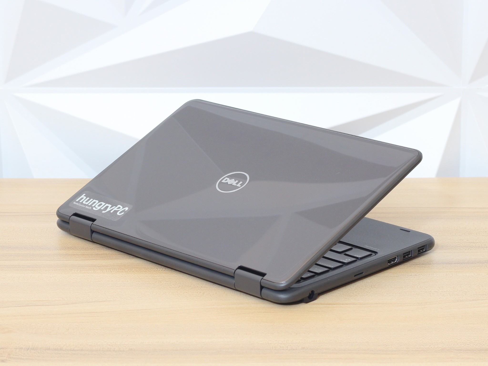 Dell Latitude 3189 Notebook Rear Side side profile view of the refurbished dell latitude 3189 12″ pentium n4200 showing chassis thickness and connectivity ports.