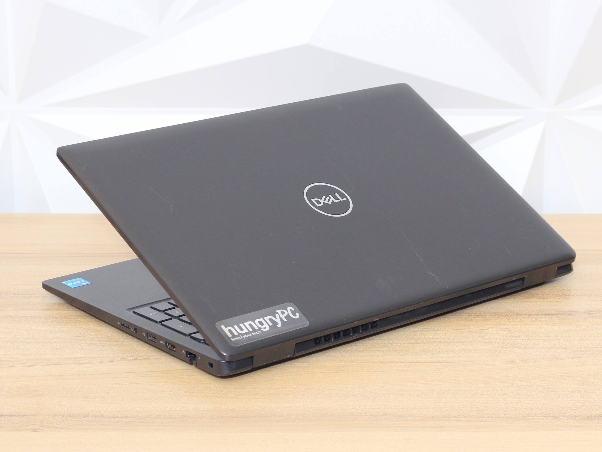 Dell Latitude 3520 Laptop Rear Side side profile view of the refurbished dell latitude 3520 15.6 inch core i5 11th gen laptop showing chassis thickness and connectivity ports.