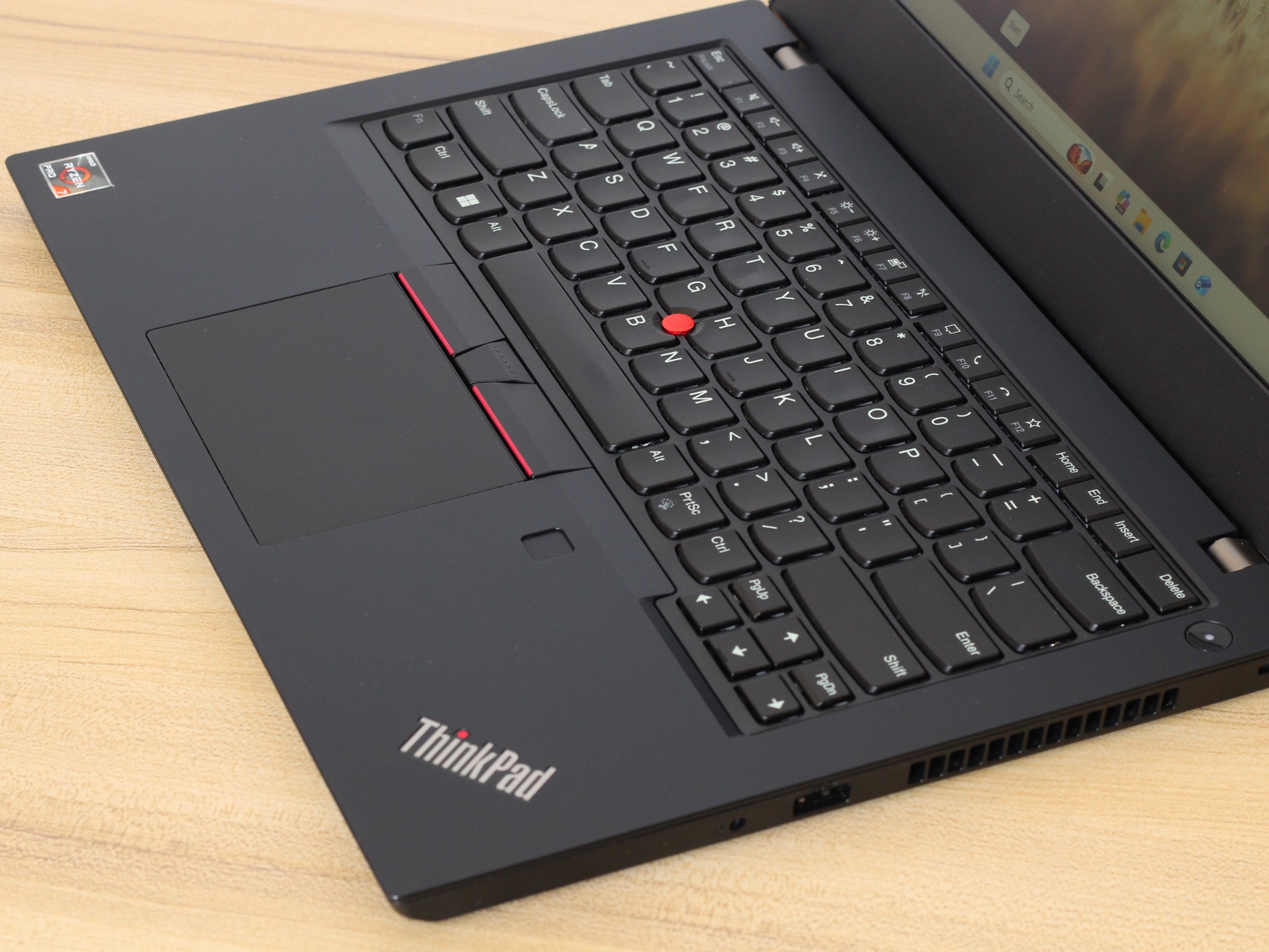Lenovo ThinkPad L14 Gen 2a Keyboard close-up of the keyboard, trackpad, and palmrest on the refurbished lenovo thinkpad l14 14 inch amd ryzen 7 pro.