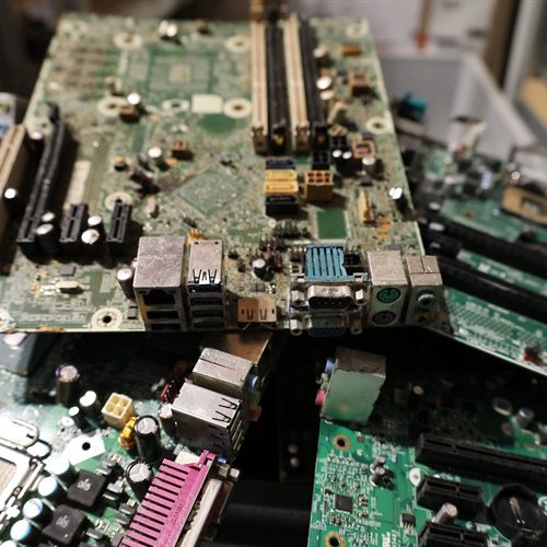 Discarded computer circuit boards representing electronic waste in New Zealand