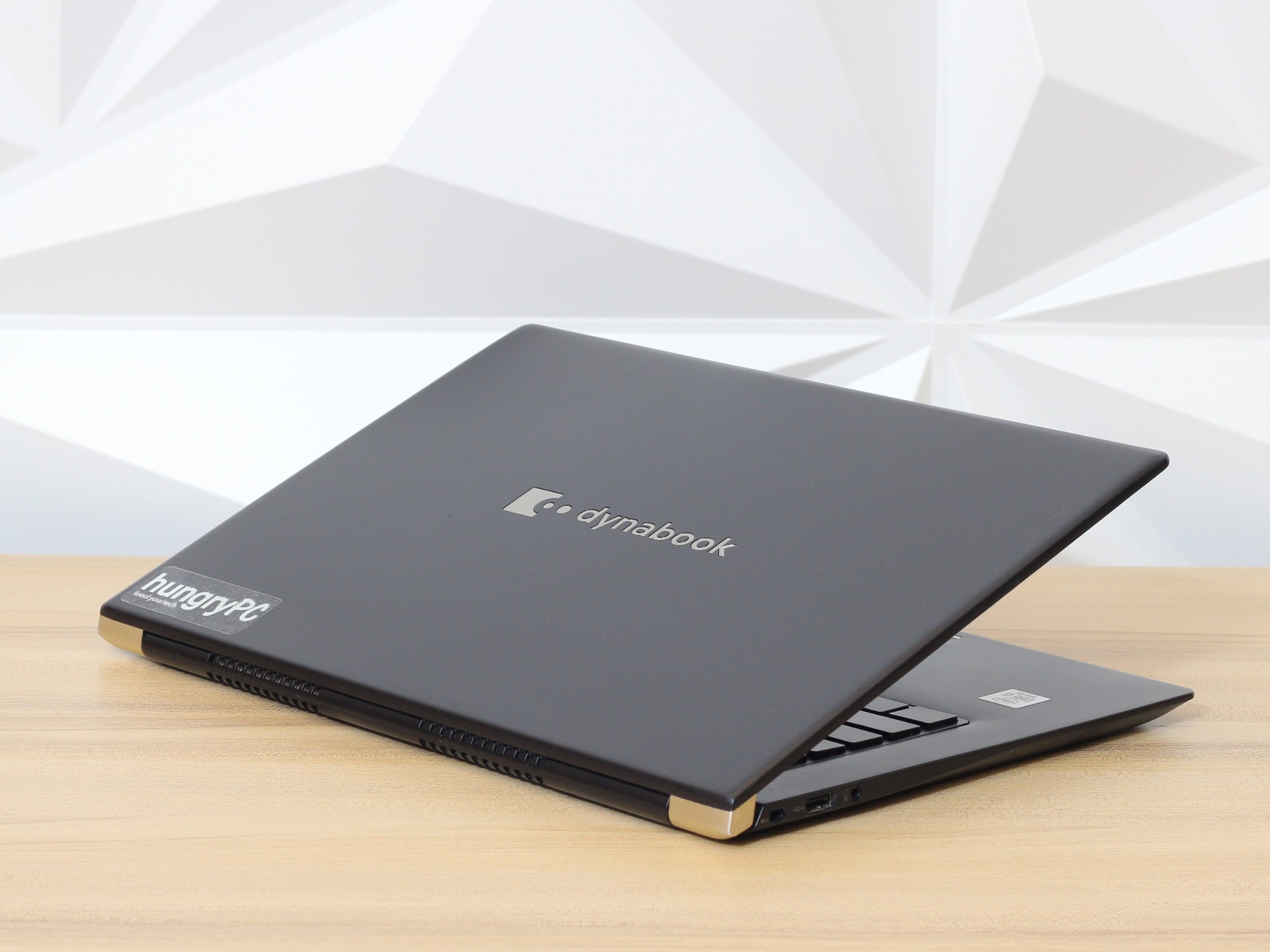 Dynabook PORTEGE X40 G Laptop Rear Side side profile view of the refurbished dynabook portege 14 inch core i5 10th gen laptop showing chassis thickness and connectivity ports.
