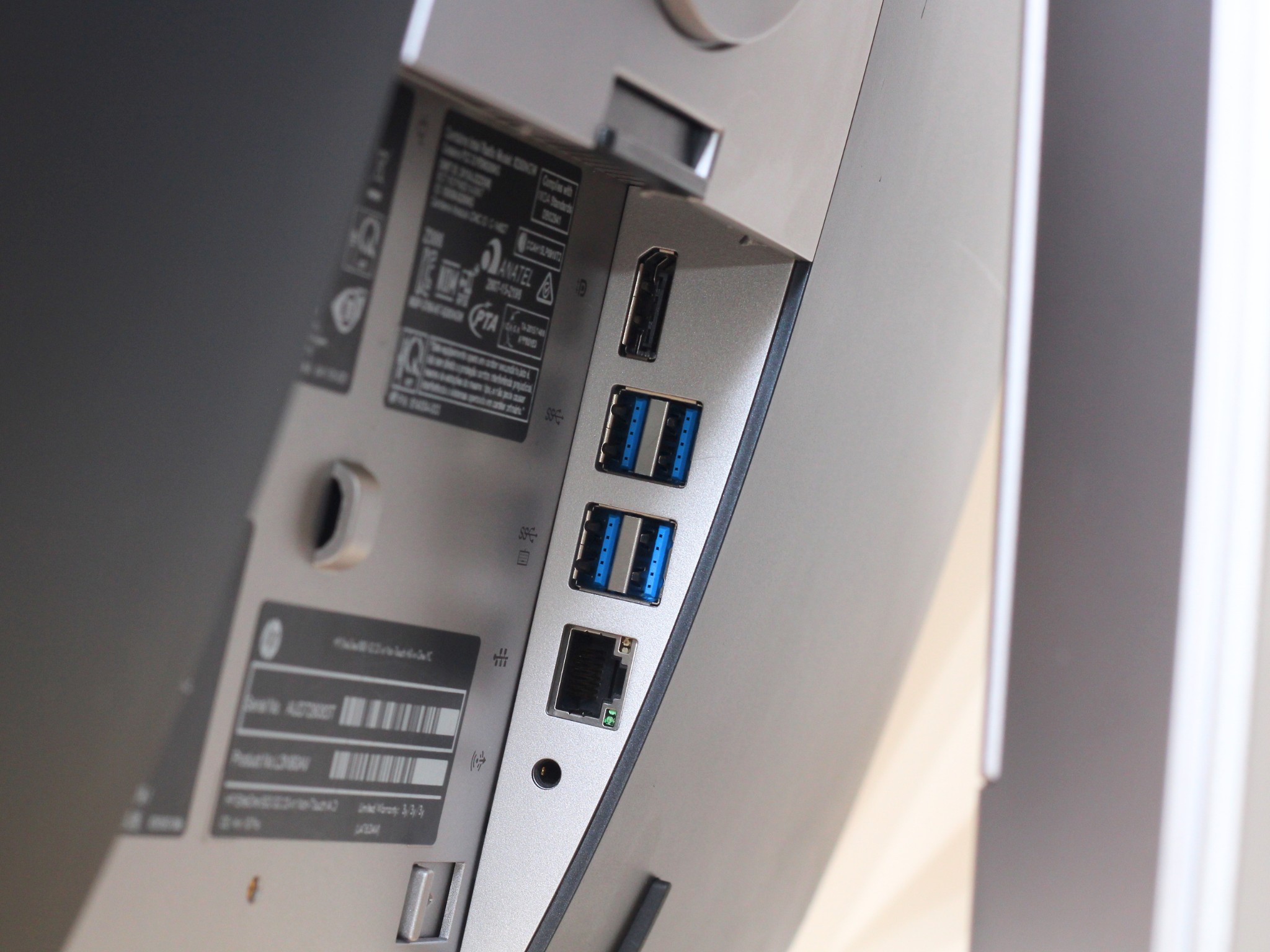 HP EliteOne 800 G2 23 Rear Ports rear panel i/o view of the refurbished hp eliteone 23 inch all-in-one pc showing usb, display, and power connections.